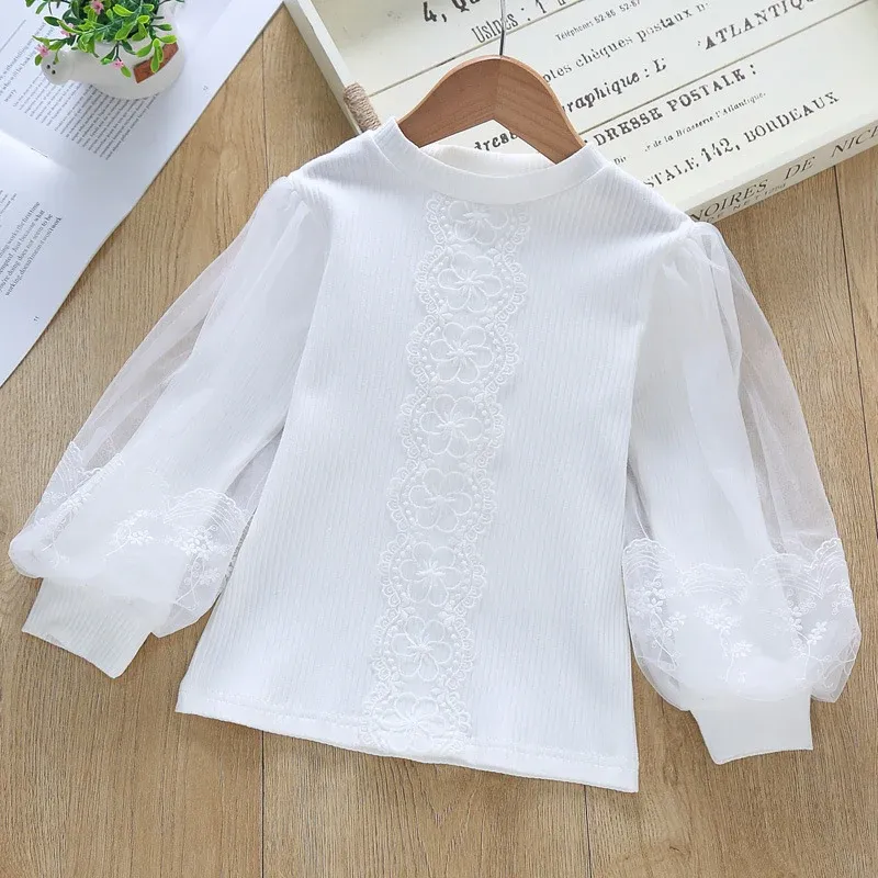 Damen Bluse mit transparenten Tüllärmeln und feinen Stickereien – Élovi